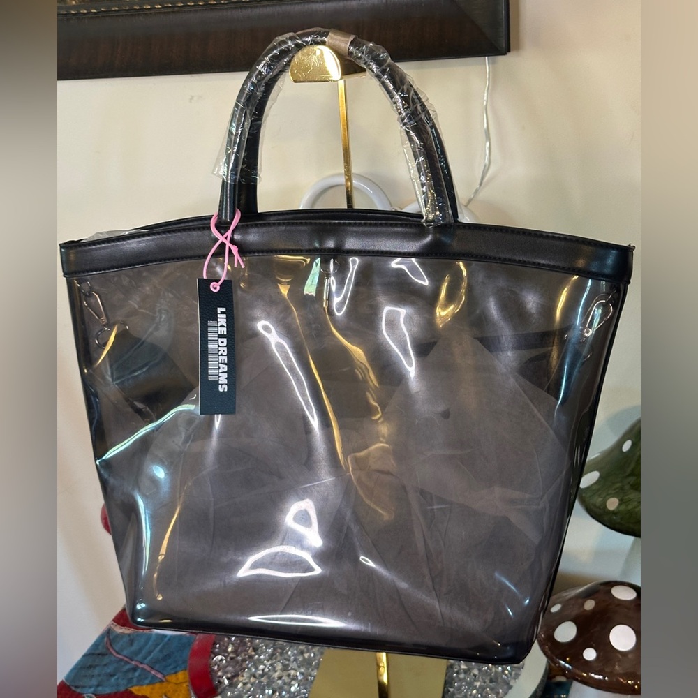 NWT - Like Dreams Clear Tote With Black Trim.